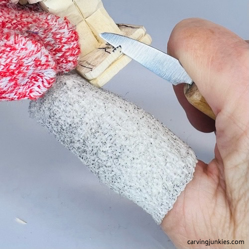 Cutting feet apart on screw-up fairy wood caricature Splitting feet on screw-up fairy wood caricature