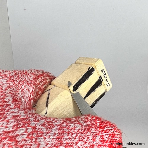 Removing wood on legs of screw-up fairy wood caricature Narrowing legs on screw-up fairy wood caricature