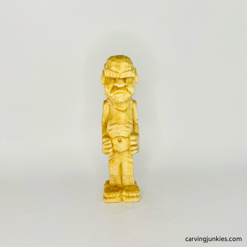 Front view of screw-up wood fairy caricature before painting Screw-up wood fairy caricature before painting