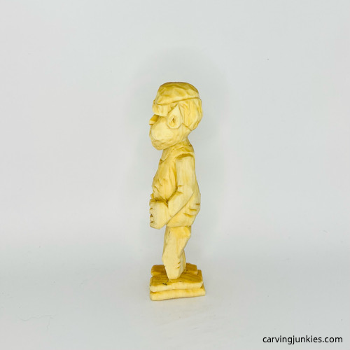 Left view of unpainted screw-up wood fairy caricature Left view of screw-up wood fairy caricature prior to painting