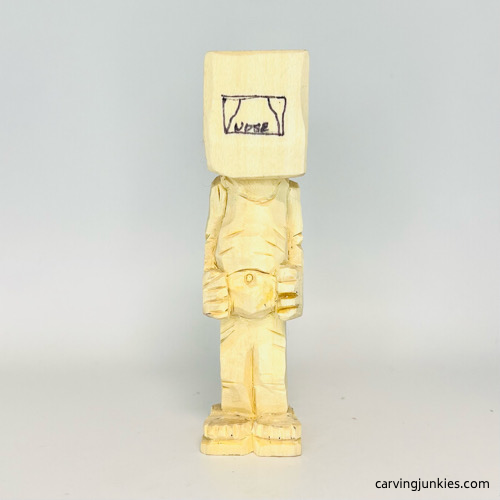 Adding nose on screw-up fairy wood caricature Setting up nose on screw-up fairy wood caricature