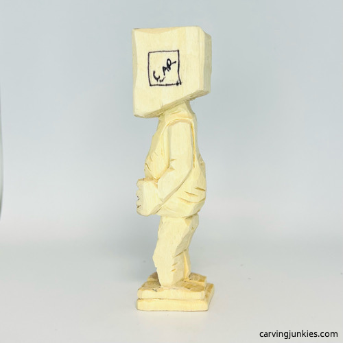 Left carved arm on screw-up fairy caricature Left ear box on screw-up fairy wood caricature