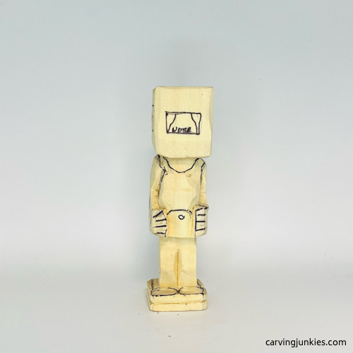 Added details to front of screw-up fairy wood caricature Drawn details on front of screw-up fairy wood caricature