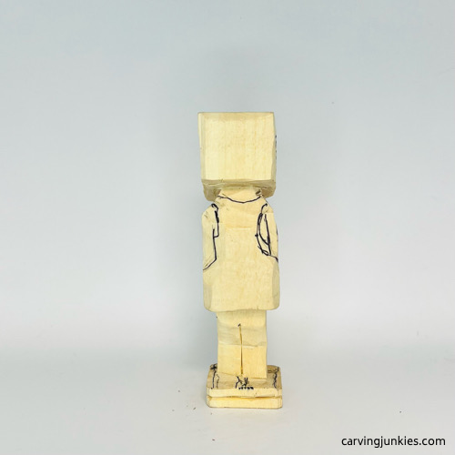 Details drawn on back of screw-up fairy wood caricature Back drawn details on screw-up fairy wood caricature