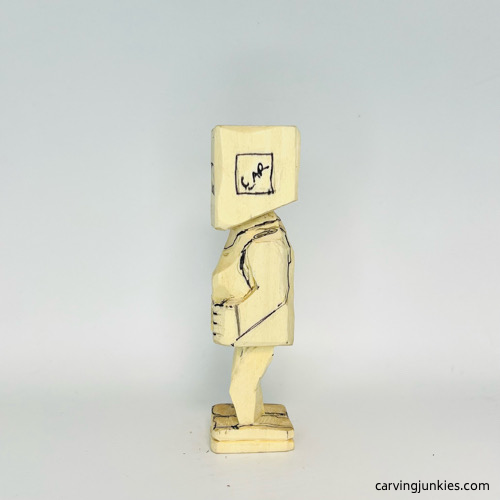 Drawn details on left side of screw-up fairy wood caricature Left drawn details on screw-up fairy wood caricature