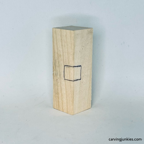 Nose is sketched on wood carved Fall gnome Nose is marked on wood carved Fall gnome
