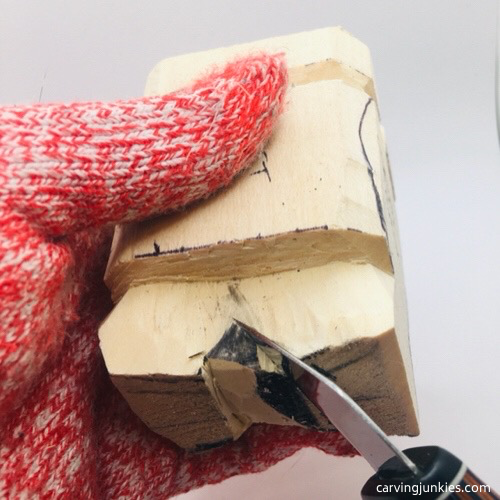 Cutting tail on fish carving