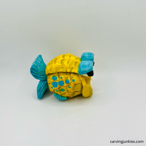 Right side of fish carving after painting Right side of painted fish carving