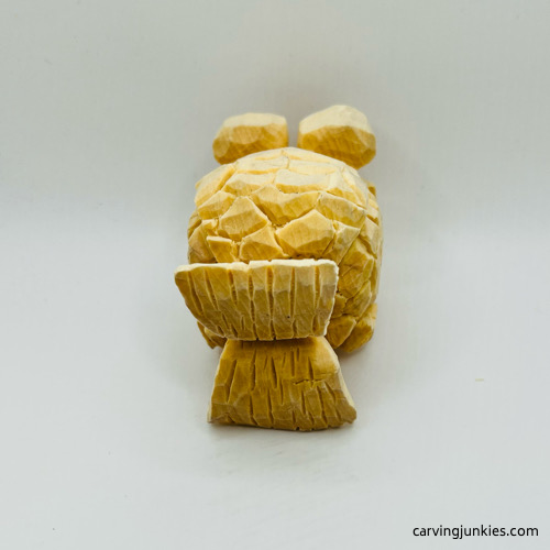 Back view of unpainted fish carving