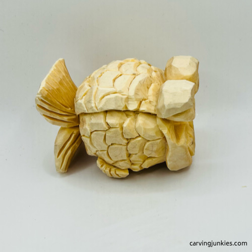 Right view of fish carving before painting