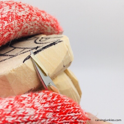 Narrowing sides on wooden fish carving