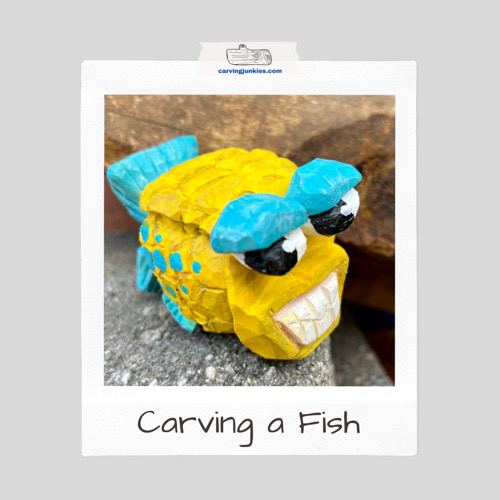 Colorful fish wood carving