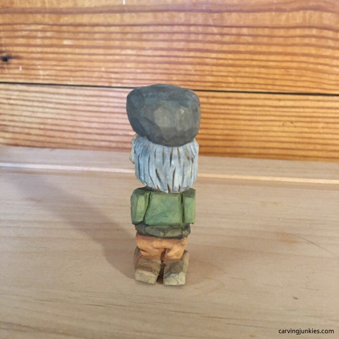 Back side of painted flat plan carving