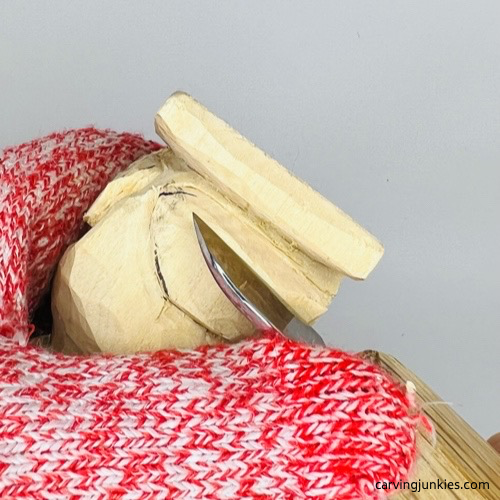 Cutting wood frog legs at an angle