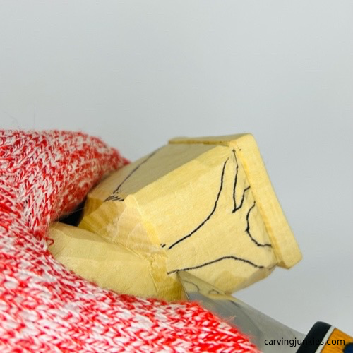 Carving legs of wooden frog carving