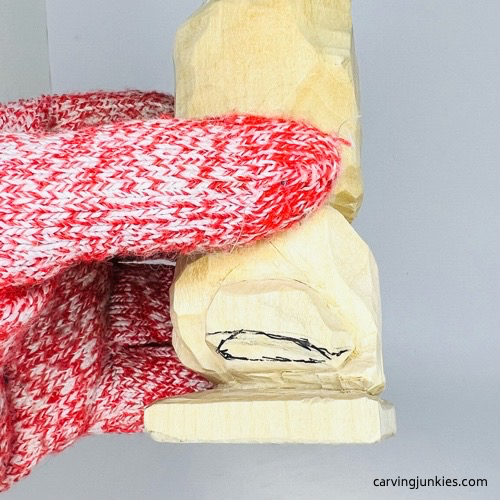 Right side of hind legs on wooden frog