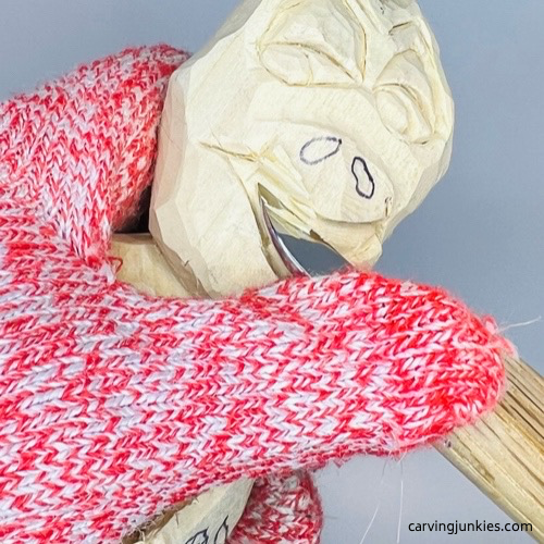 Carving mouth of wooden frog carving