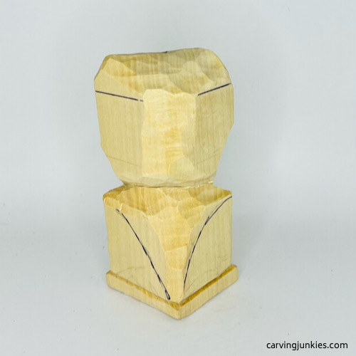 Back side of head on wooden frog carving