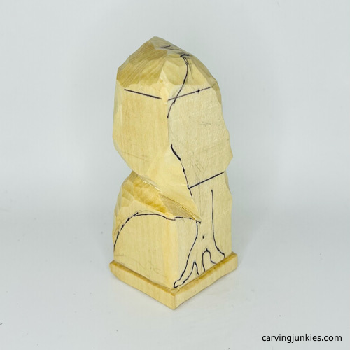 Right view of head on wooden frog carving