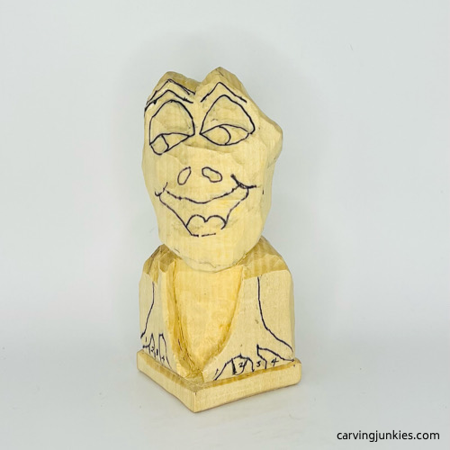 Added toes on frog carving