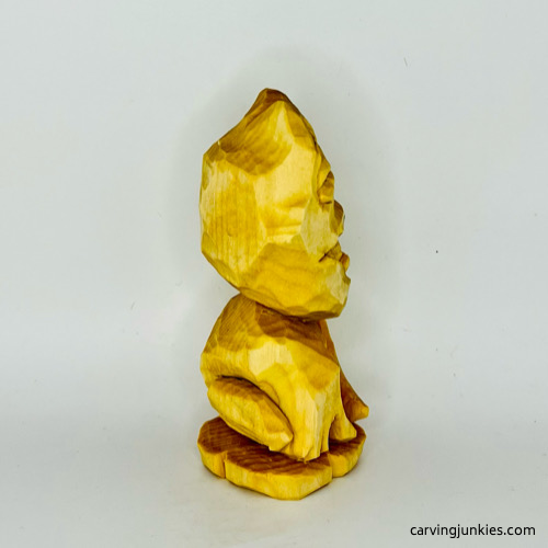 Right view of unpainted frog carving