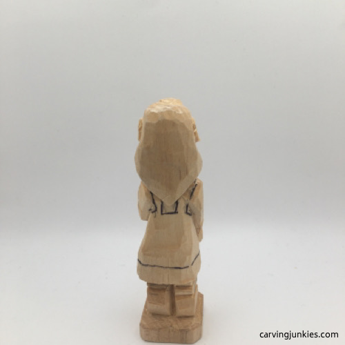 Back view of apron on female wood carving