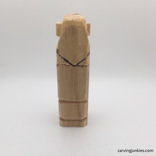 Scarf on female wood carving