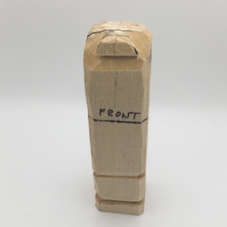 Completed second pyramid cut on female wood carving