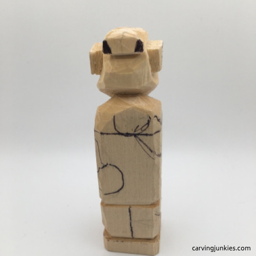 Colored wood to remove on female wood carving