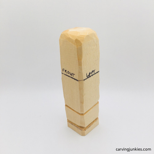 Rounded front corners of female wood carving