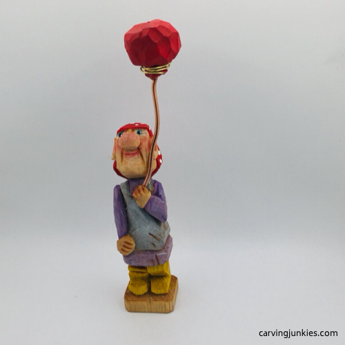 Front view of painted wood carved woman