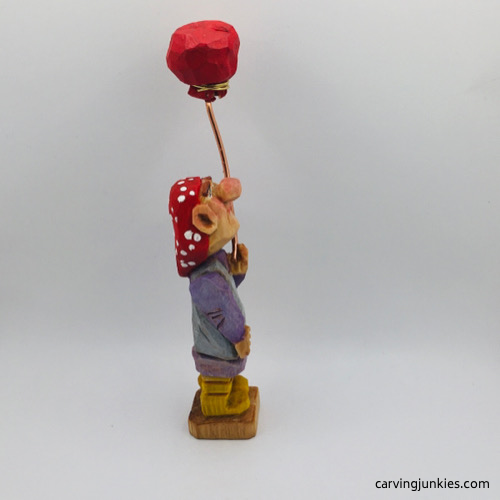 RIght view of painted wood carved woman