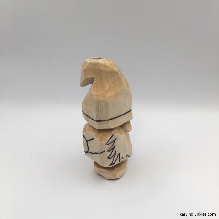 Notched hat on wooden gnome