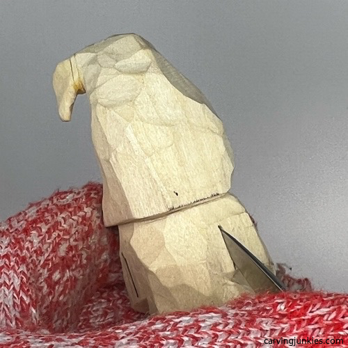 Separating back of arms on gnome carving