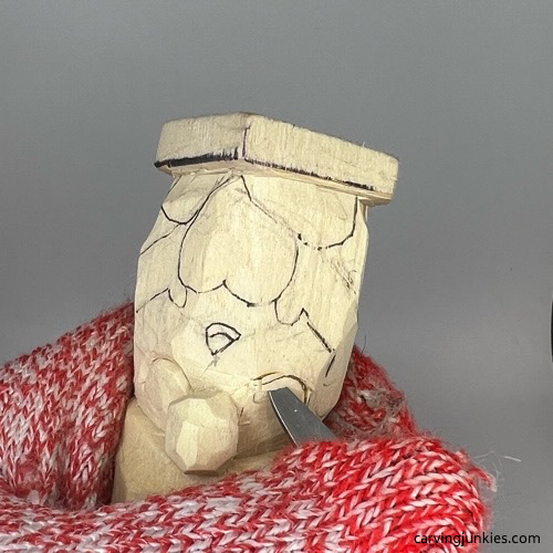 Carving cheeks on gnome carving