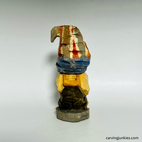Back side of painted gnome carving