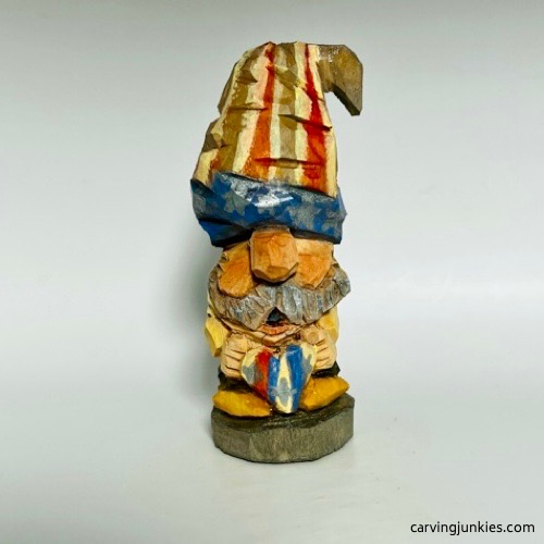 Front side of painted gnome carving