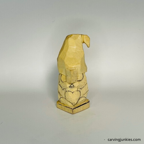 Front details drawn on gnome carving