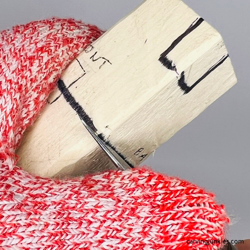 Separating head on gnome carving