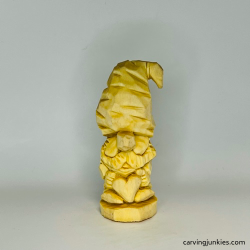 Front view of unpainted gnome carving