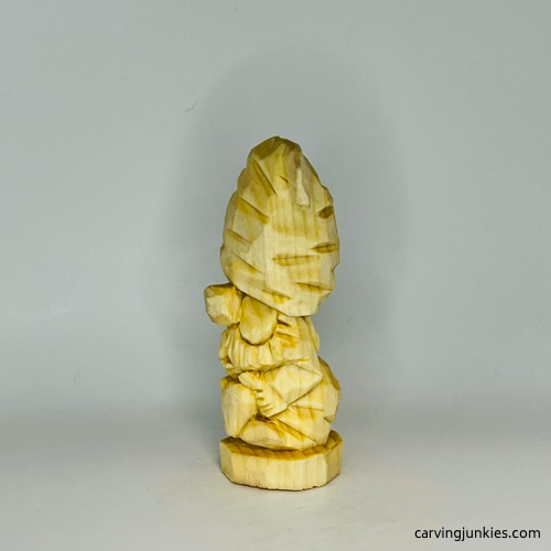 Left side of unpainted gnome carving