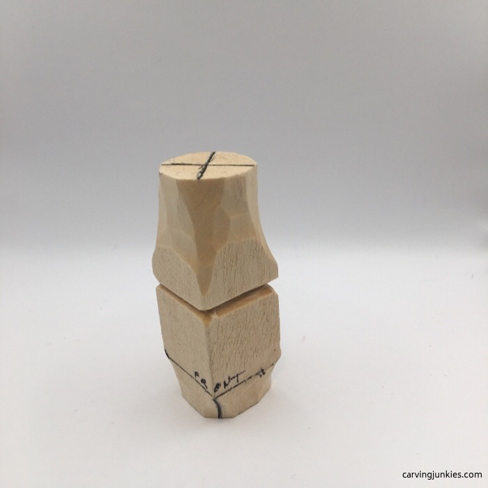 Rounding feet of wood carve gnome