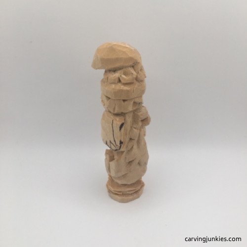 Carving hair on wood carved gnome