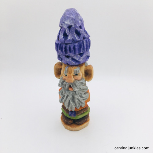 Front view of painted wood carved gnome
