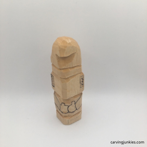 Mittens are sketched for wood gnome carving tutorial