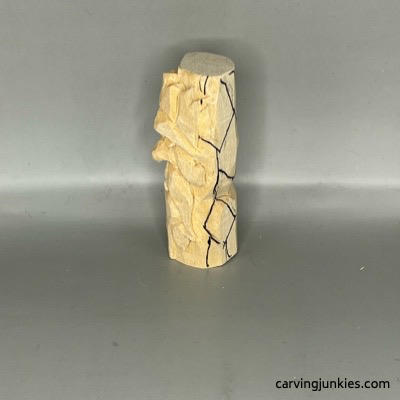 Left view of design on wooden green man