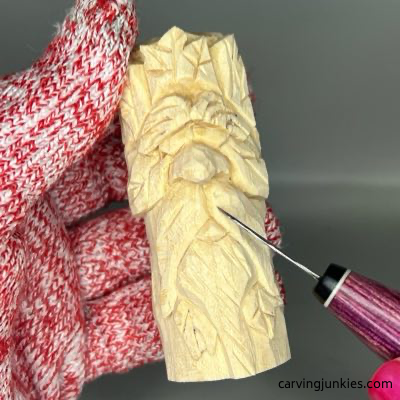 Carving mustache with Helvie detail knife on green man