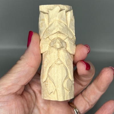 Progress on from of wood carved green manh