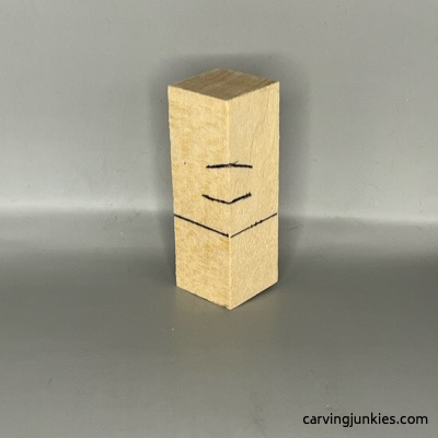 Wood block with guidelines a green man