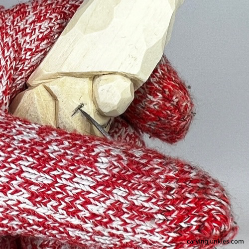 Carving mouth on Halloween gnome